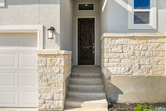 entrance to property with a garage