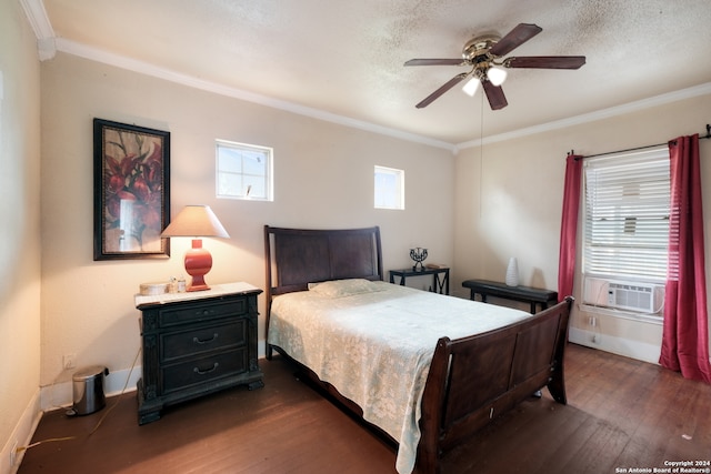 bedroom with ornamental molding, dark hardwood / wood-style flooring, and ceiling fan