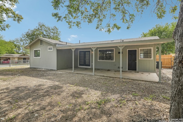 rear view of house featuring a patio