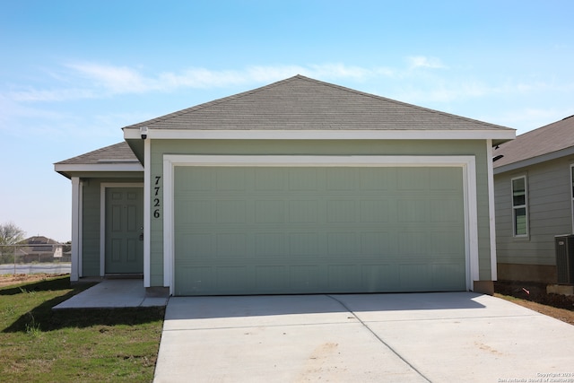 ranch-style home featuring a garage