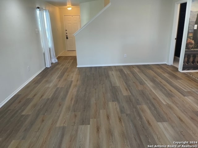 interior space with dark wood-type flooring