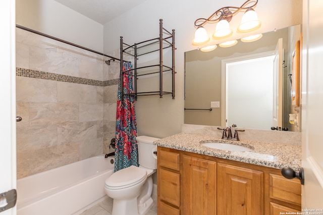 full bathroom with tile patterned floors, vanity, shower / tub combo, and toilet