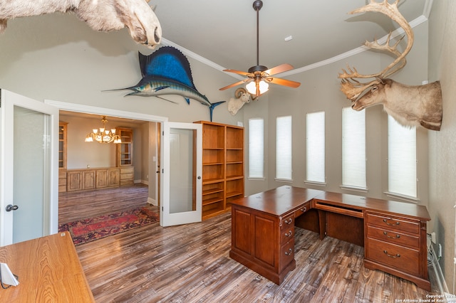 office area with ceiling fan with notable chandelier, crown molding, and dark wood-type flooring