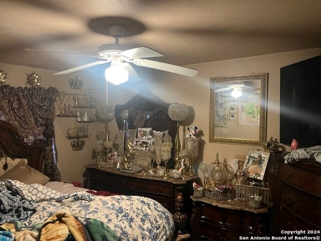 bedroom featuring ceiling fan