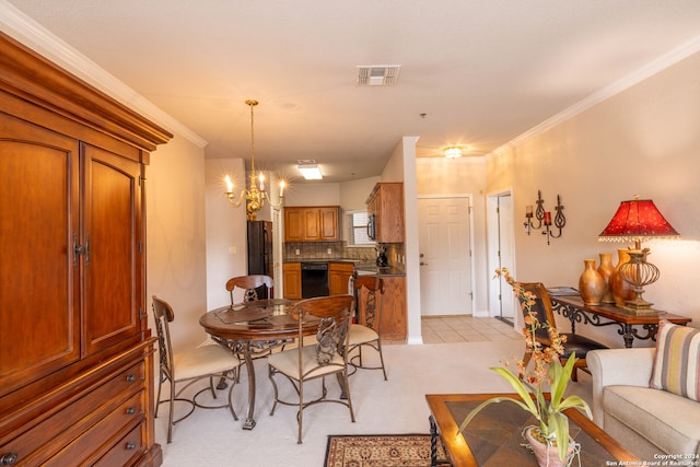 carpeted dining space with ornamental molding and a notable chandelier