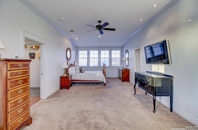 carpeted bedroom featuring ceiling fan and ornamental molding