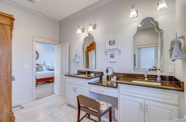 bathroom featuring vanity, tile flooring, and ornamental molding