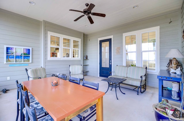 view of terrace featuring ceiling fan