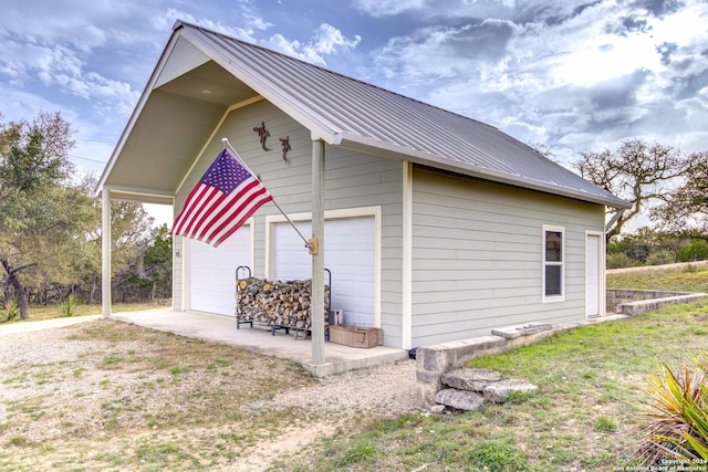 view of home's exterior with a garage