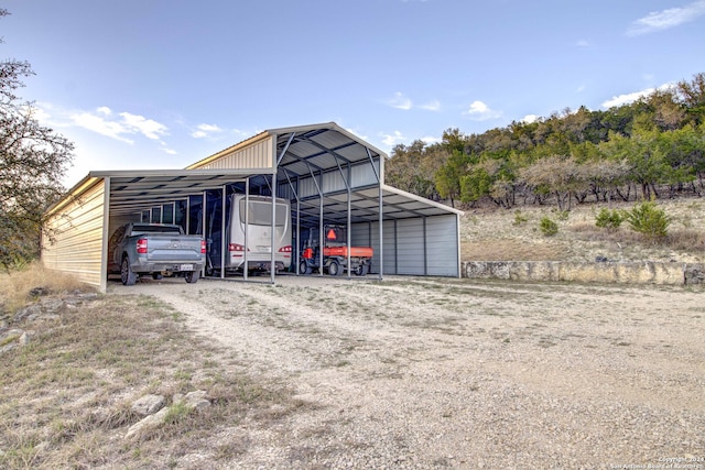 exterior space with a carport