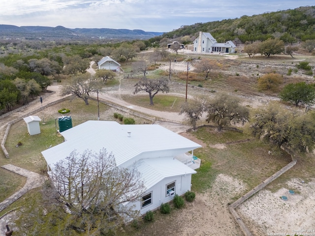 drone / aerial view featuring a mountain view