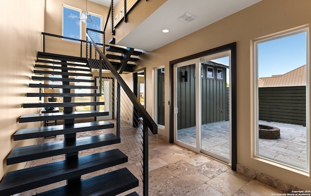 stairs with light tile floors