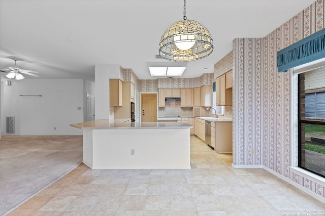 kitchen featuring light tile floors, light brown cabinets, decorative light fixtures, and ceiling fan