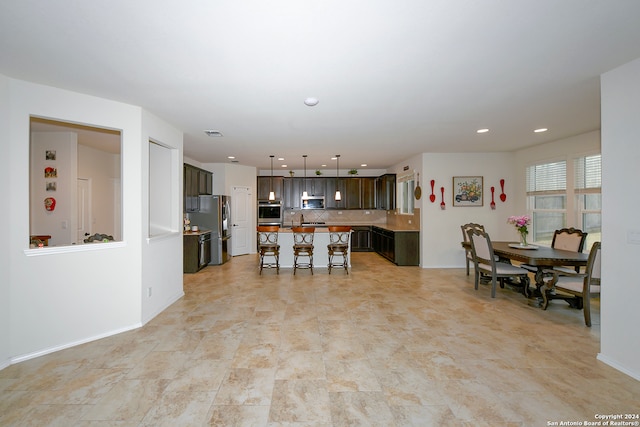 tiled dining area with sink