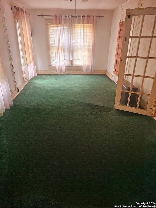 spare room featuring carpet flooring