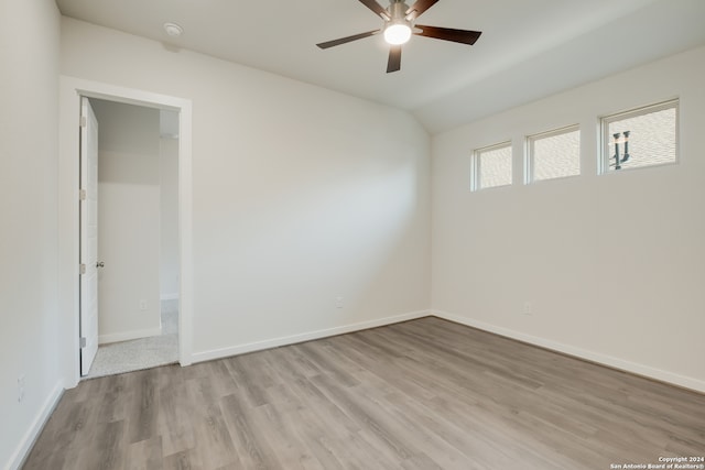 unfurnished room with ceiling fan and light wood-type flooring