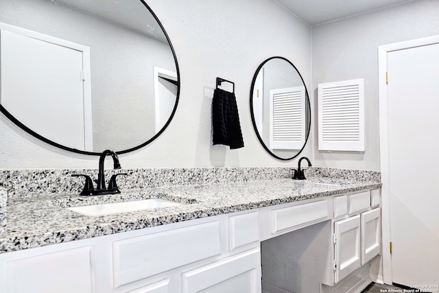 bathroom with double sink vanity