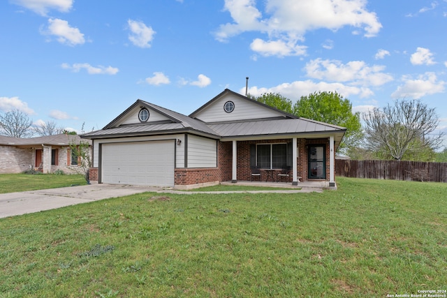 ranch-style home with a front lawn, covered porch, and a garage