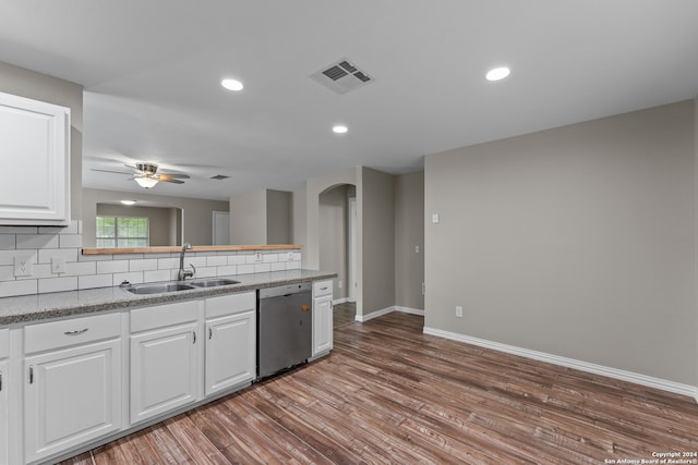 kitchen featuring hardwood / wood-style flooring, sink, white cabinets, ceiling fan, and stainless steel dishwasher