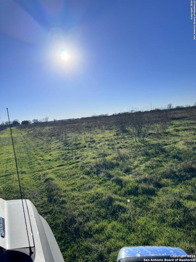 view of yard featuring a rural view