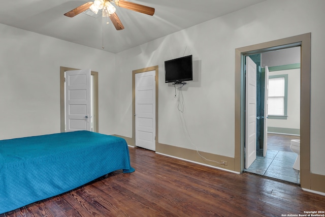 bedroom featuring dark hardwood / wood-style flooring and ceiling fan