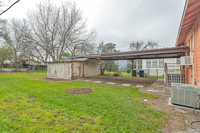 view of yard with central AC