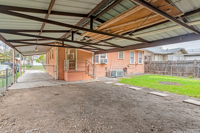 view of horse barn with a yard