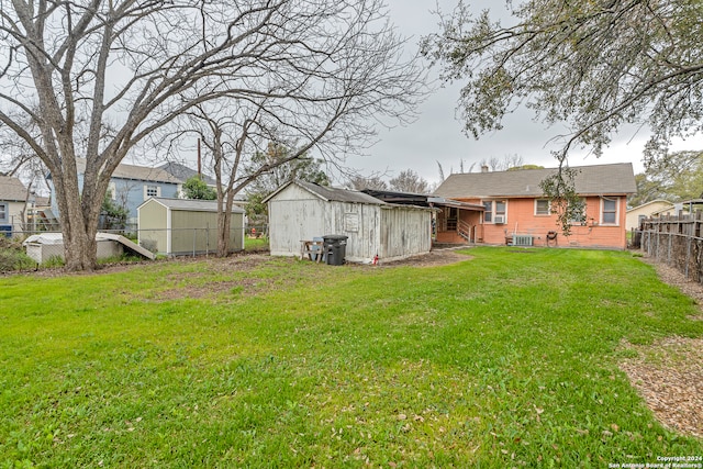 view of yard with a storage shed