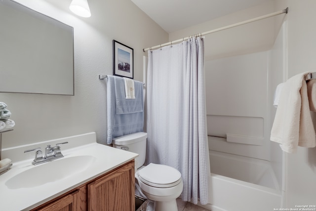 full bathroom featuring tile patterned floors, toilet, shower / tub combo with curtain, and vanity