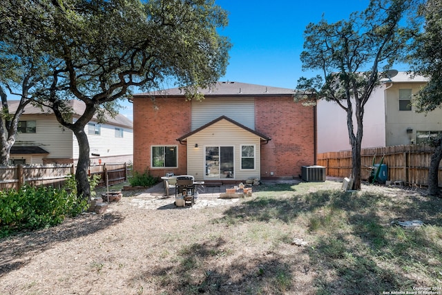 back of house with a patio area