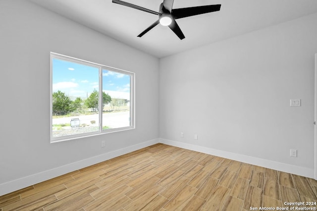 unfurnished room featuring ceiling fan and light hardwood / wood-style floors