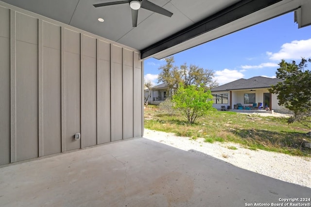 view of patio featuring ceiling fan