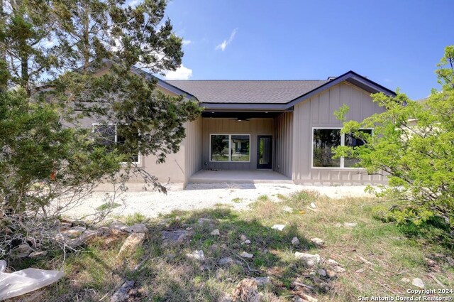 back of property featuring a patio