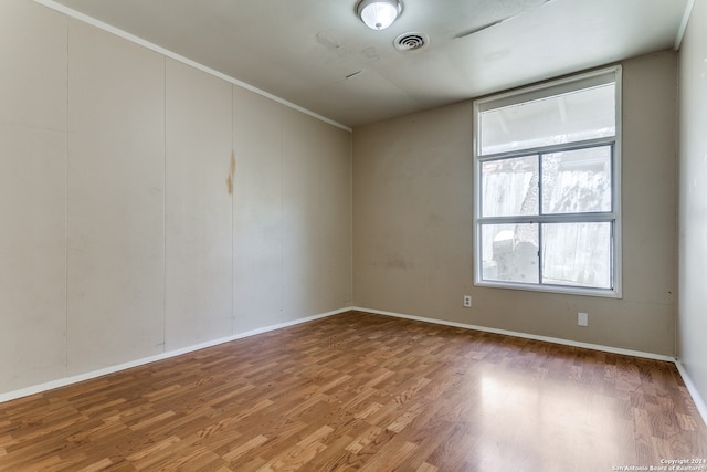 empty room featuring dark hardwood / wood-style flooring