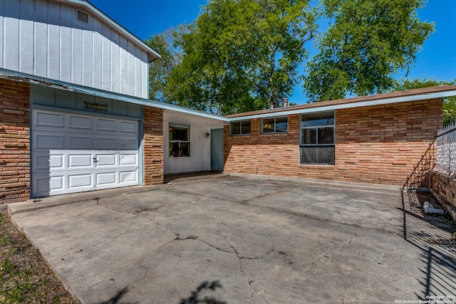 exterior space featuring a garage