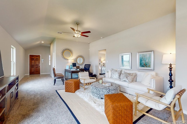 carpeted living room featuring a healthy amount of sunlight, vaulted ceiling, and ceiling fan