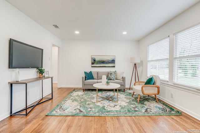 living room with light hardwood / wood-style floors