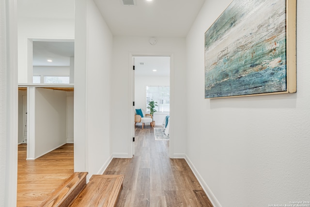 corridor featuring light wood-type flooring