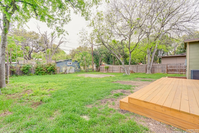 view of yard with a deck