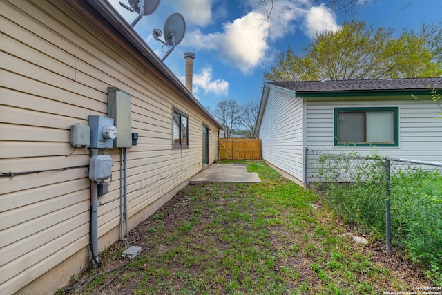 view of property exterior featuring a patio area