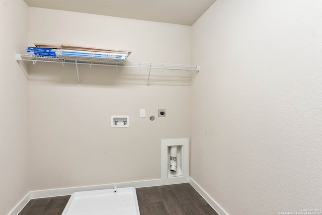 washroom featuring washer hookup, hookup for an electric dryer, and dark wood-type flooring