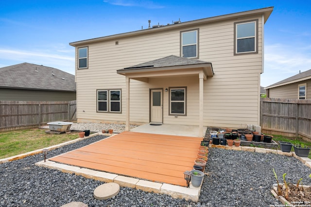 rear view of house with a patio area