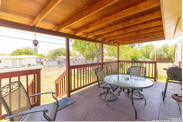 wooden deck featuring a patio