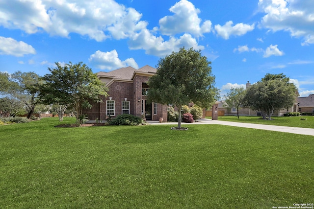 view of front of house with a front lawn