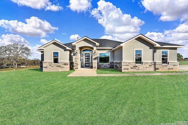 view of front facade with a front yard