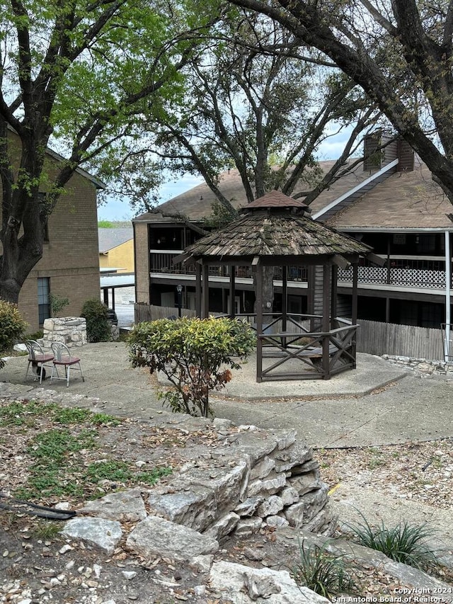 view of front facade with a patio area