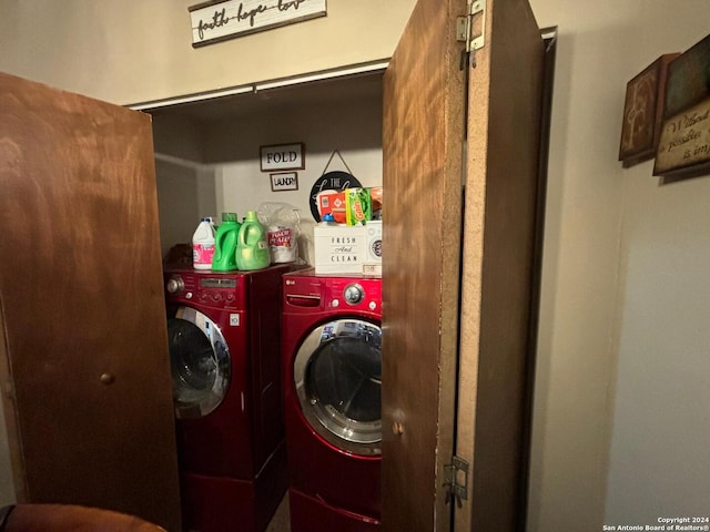 laundry area with separate washer and dryer