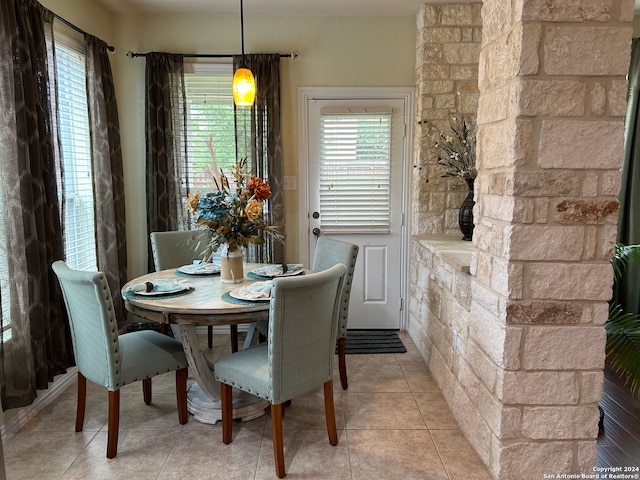 dining area with light tile floors