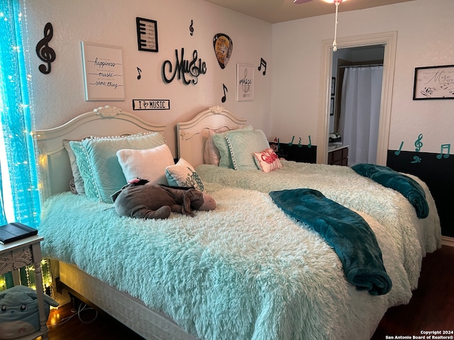 bedroom featuring wood-type flooring