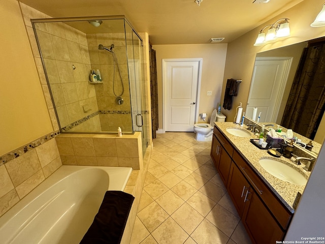 bathroom with tile floors, independent shower and bath, and double vanity